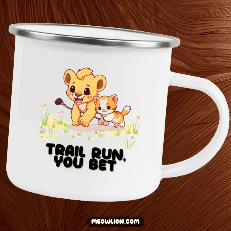 Funny camping mug showing a lion cub energetically chasing a kitten through a field, ideal for outdoor humor.
